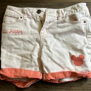 Light pink shorts.